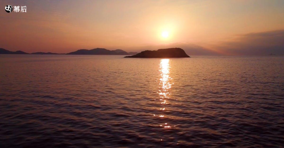 854999|太阳日落时无人机航拍海上岛屿4KCC0视频素材插图