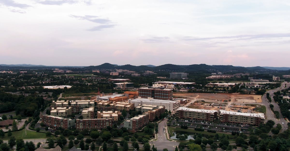 2835985|航拍施工中的建筑山脉环绕4kCC0视频素材插图