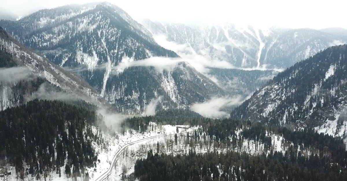 DJI, 冬季山林雪景覆盖航拍2k高清CC0视频素材插图